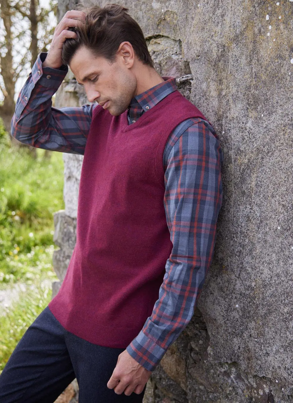 V neck lambswool slipover, short sleeved sweater vest in pochard (red), side