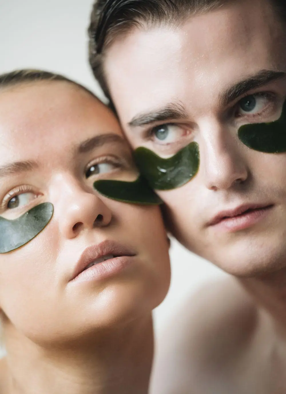 Male and female wearing Voya Renewal Eyes Organic Seaweed Eye Masks