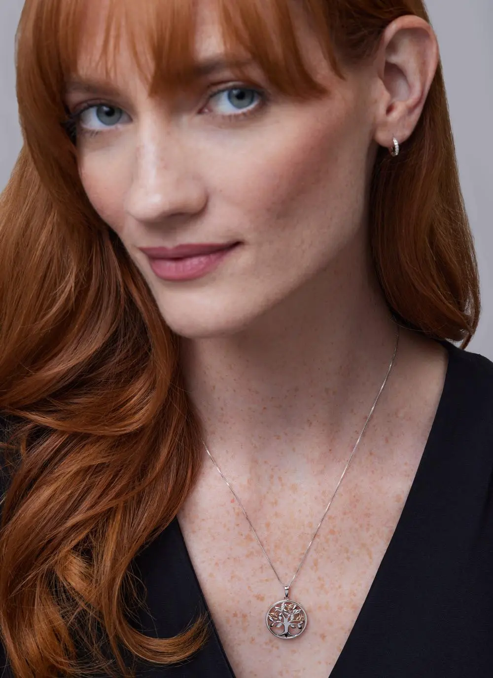 Red haired model wearing Sterling Silver 